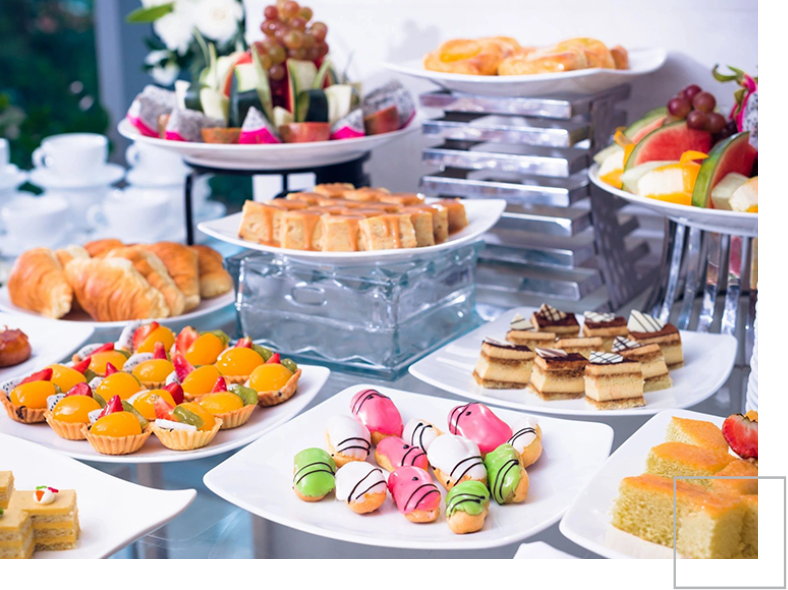 A table filled with lots of different types of food.